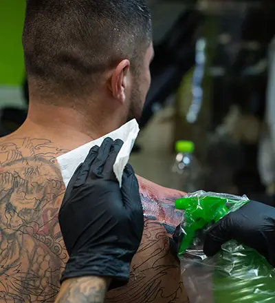 A detailed back tattoo, showcasing the artistry of a tattoo artist in Cancun, Mexico.