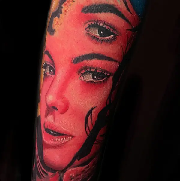 Tattoo using red ink inspired in beauty