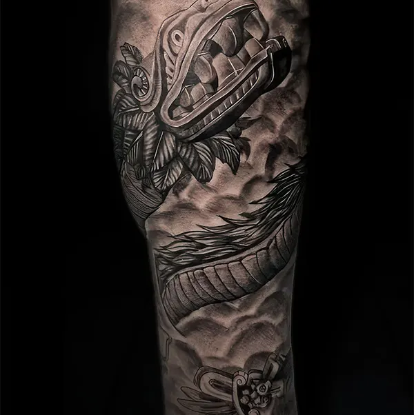 Mexican Aztec Tattoo of Quetzalcoatl, showcasing traditional Mesoamerican art