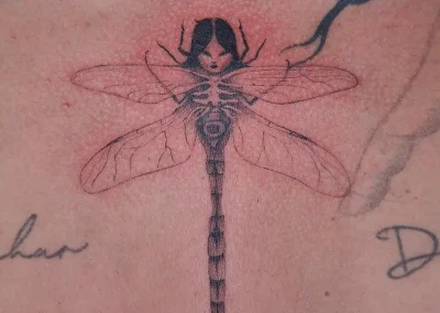 Insect magical creature tattoo