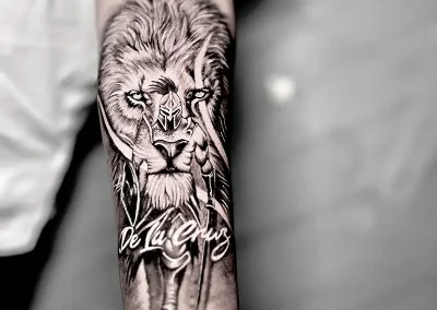 Savage lion and warrior tattoo