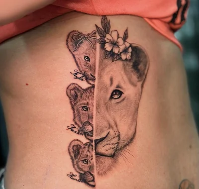 Medium custom tattoo featuring a split design of a lioness and three cubs.